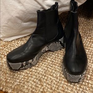 Black snakeskin platform boots
